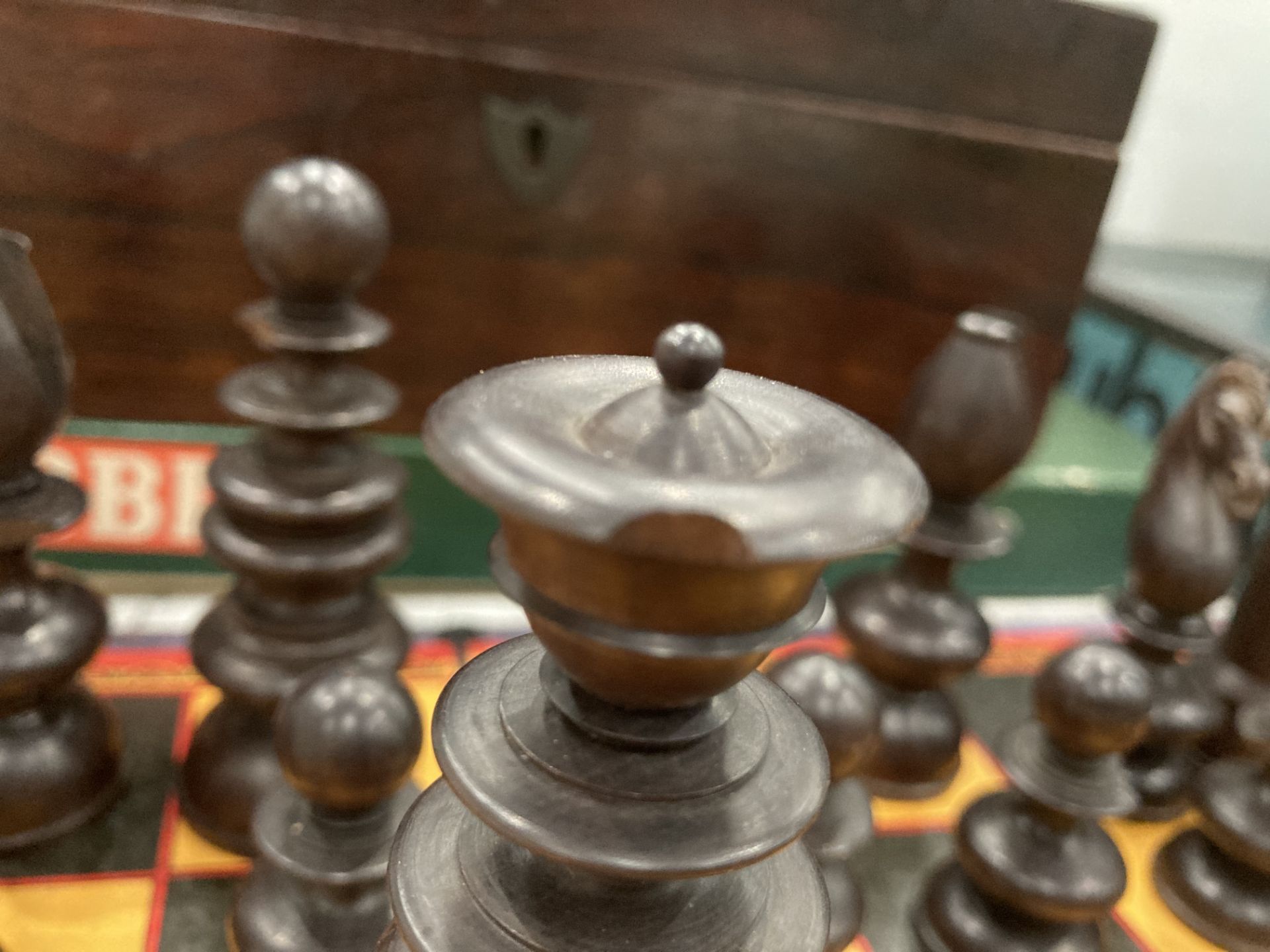 A wood chess set with one replacement castle and several pieces damaged complete with a walnut box - Image 6 of 13