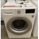 An LG Inverter Direct Drive 9kg automatic washing machine complete with manual advised bought new