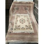 A light brown dragon patterned Chinese rug 120cm x 180cm and a cream patterned Chinese rug 60cm x