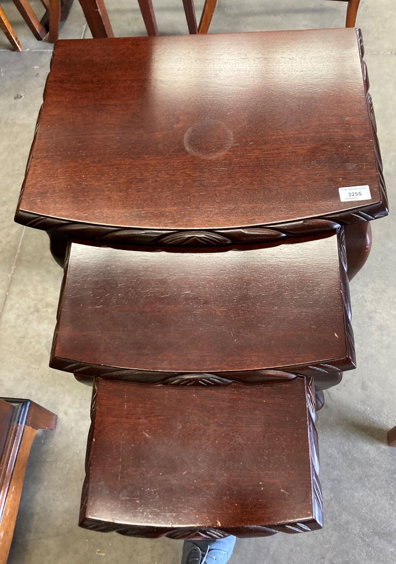 A dark mahogany finish nest of three coffee tables - heat mark to top - Image 2 of 2