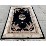 A black and beige patterned Chinese rug 280cm x 183cm (9x6)