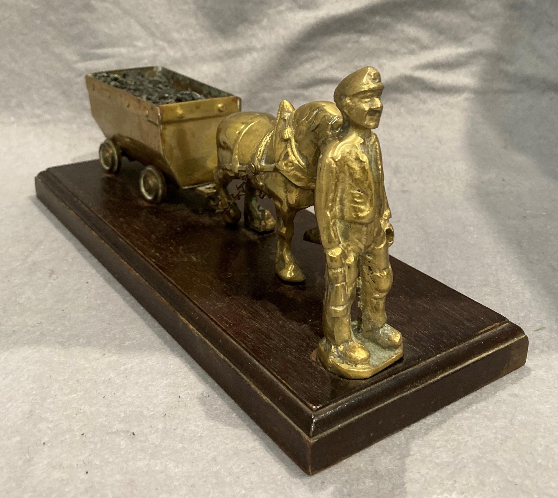 A brass mining model featuring a pit pony pulling a coal wagon and a miner 31cm long - Image 2 of 3