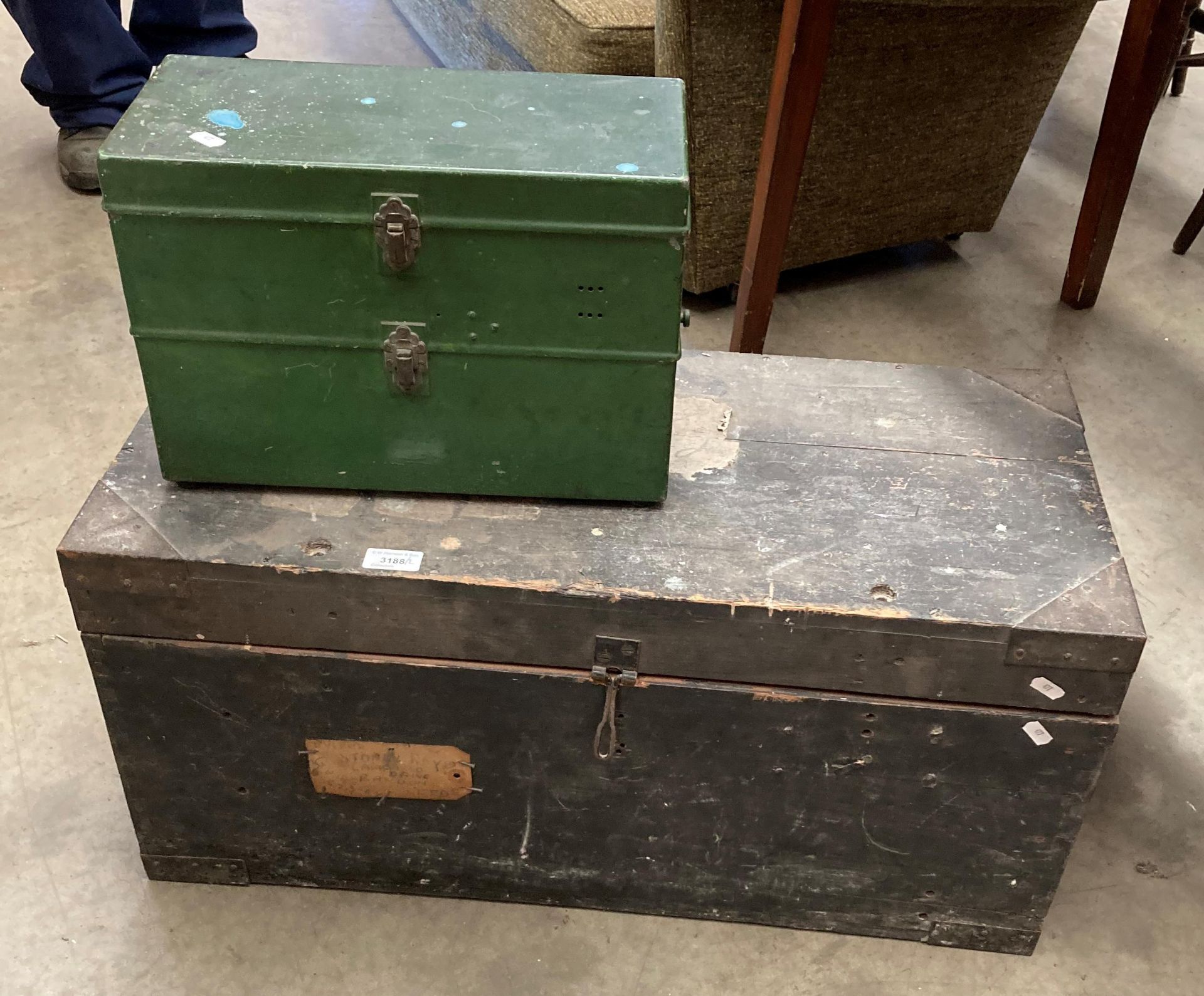 A black painted pine storage chest 74cm x 35cm x 36cm high and a small green metal storage box