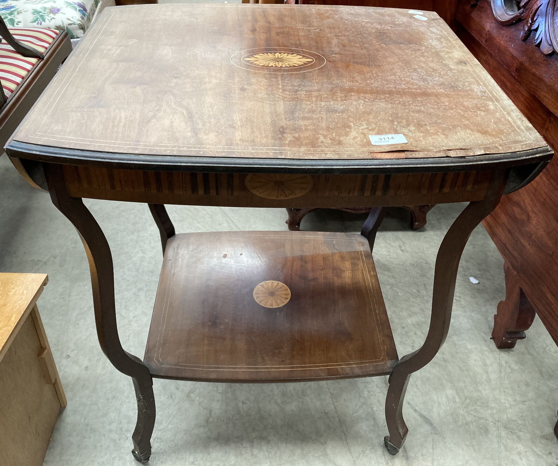 An Edwardian inlaid rosewood drop leaf occasional table with an undershelf missing some veneer 53cm