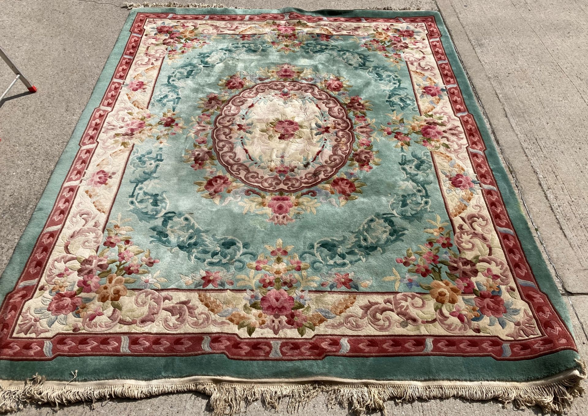 A green beige and pink patterned Chinese rug 275cm x 230cm