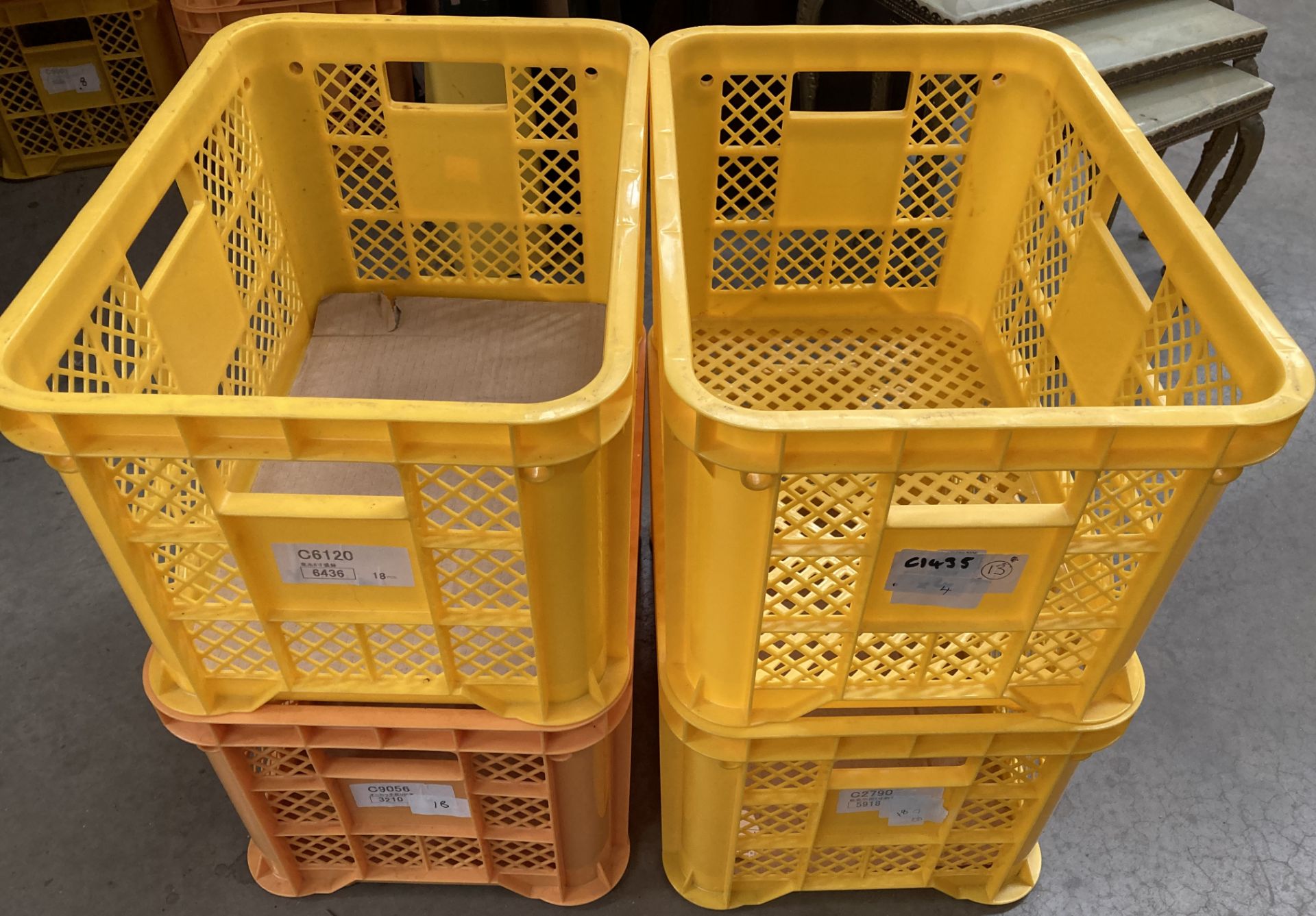 Ten yellow plastic stacking crates each 50cm x 36cm x 50cm deep