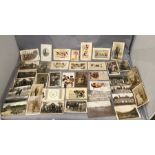 Forty assorted postcards and pictures,