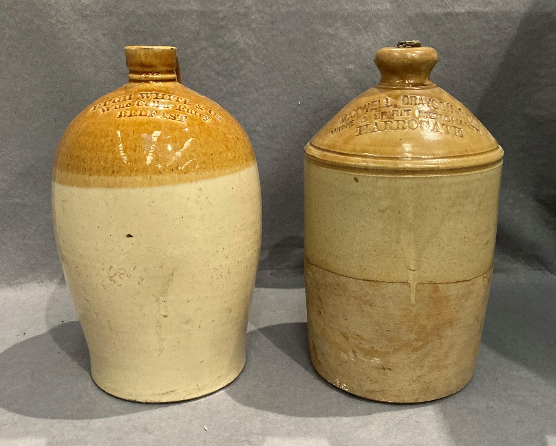 Two glazed flagons - Hugh White & Co, Belfast and Maxwell Grayson & Co, Harrogate,