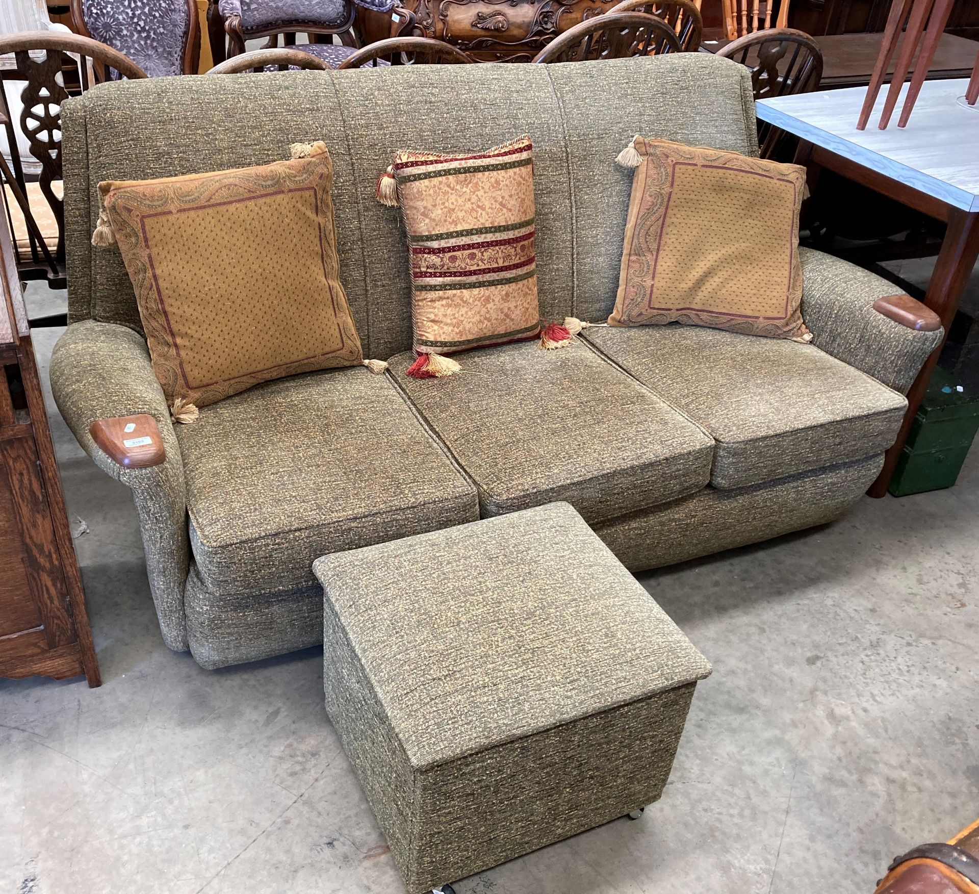 A green moquette three seater settee with matching lift top pouffe/storage box [Please note - the