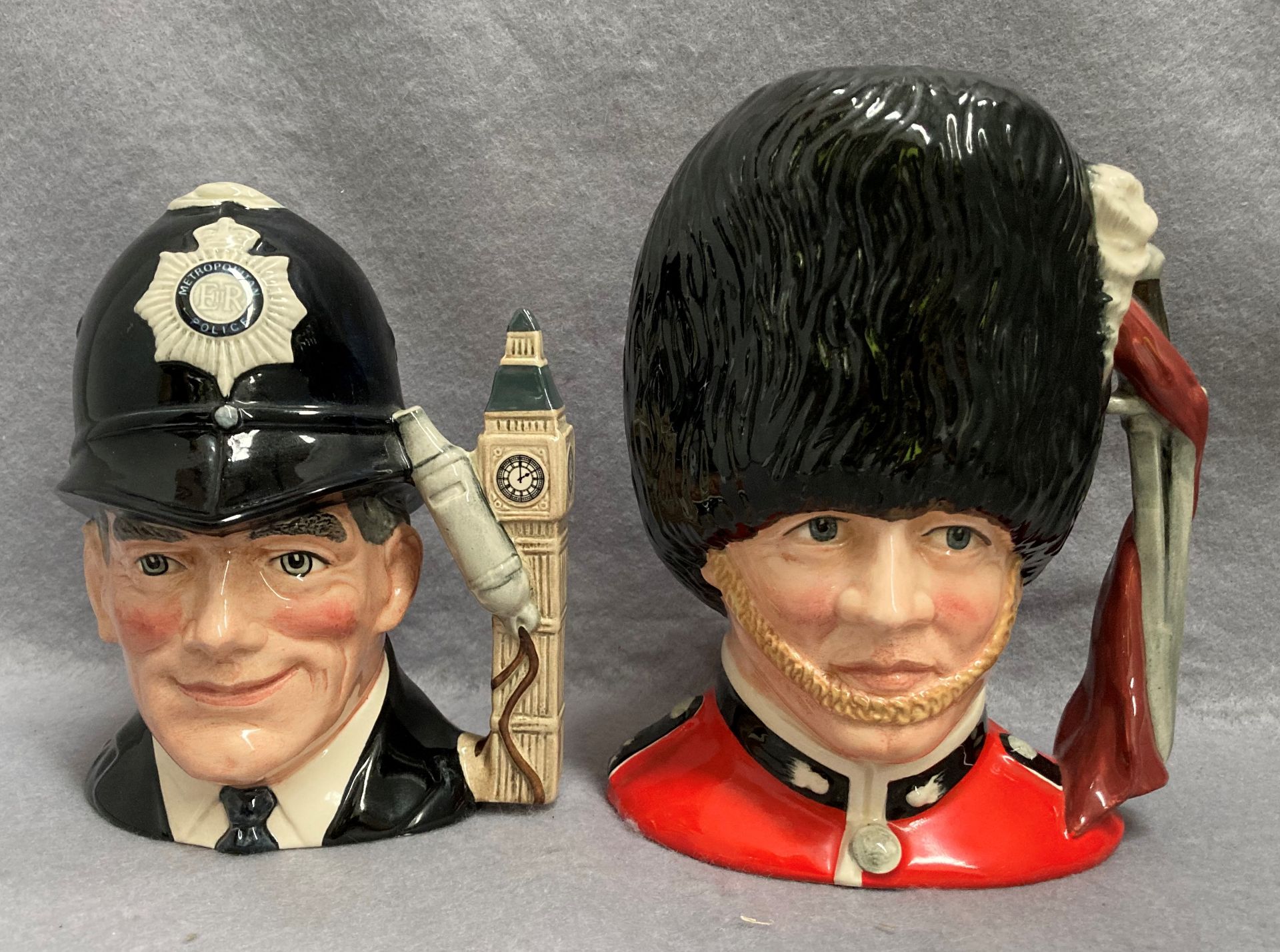 Two Royal Doulton character jugs each approximately 20cm high - The London Bobby D6744 and The