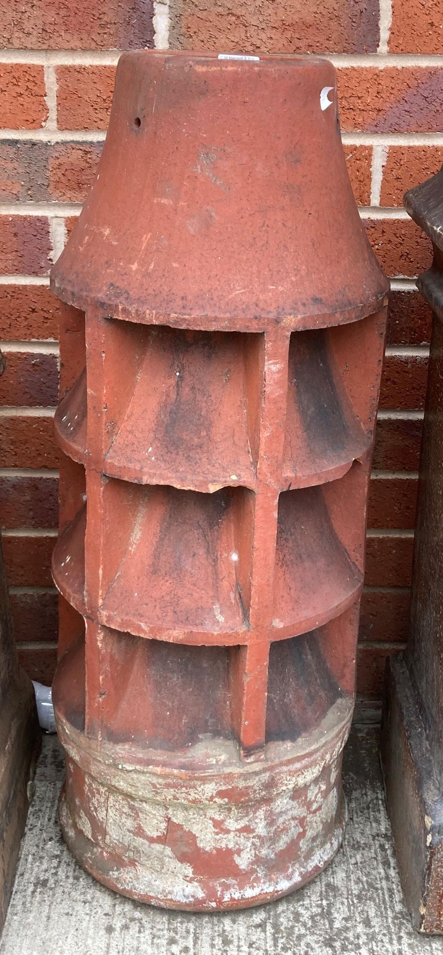 A terracotta chimney pot 80cm