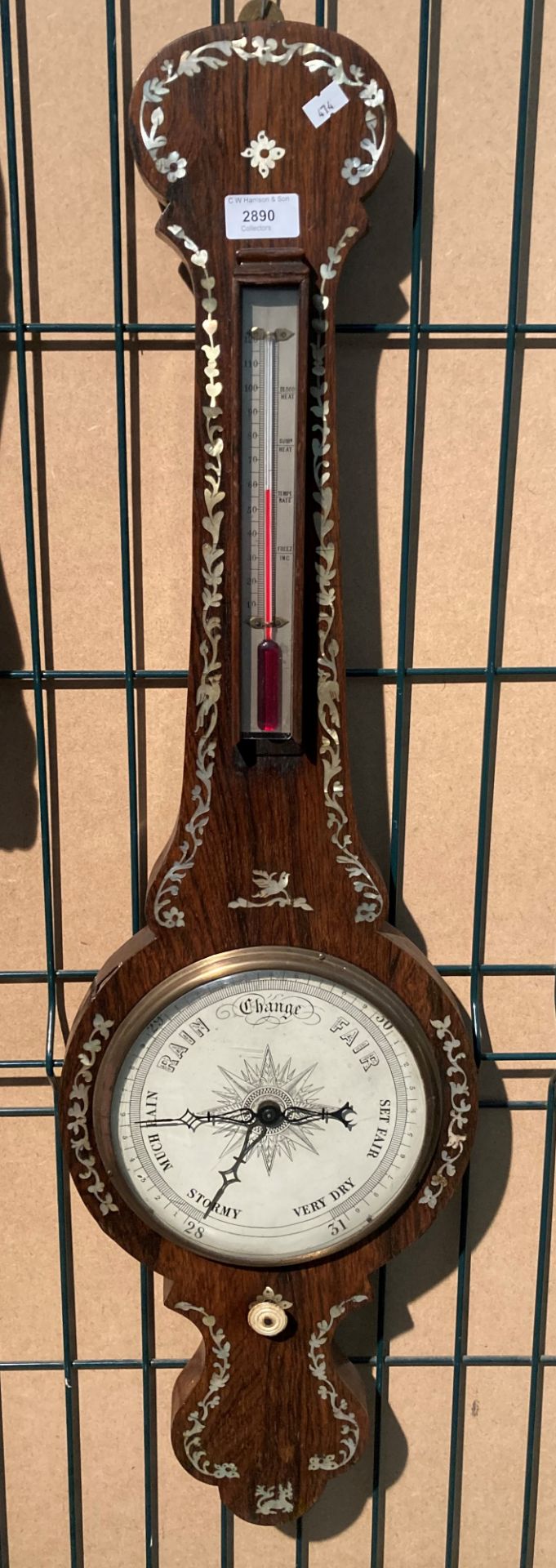 A Rosewood veneered wall barometer with mother of pearl inlay 90cm