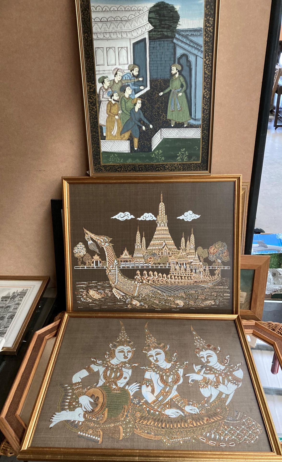 Two framed embroidered oriental pictures each 40cm x 52cm and a framed watercolour of an oriental