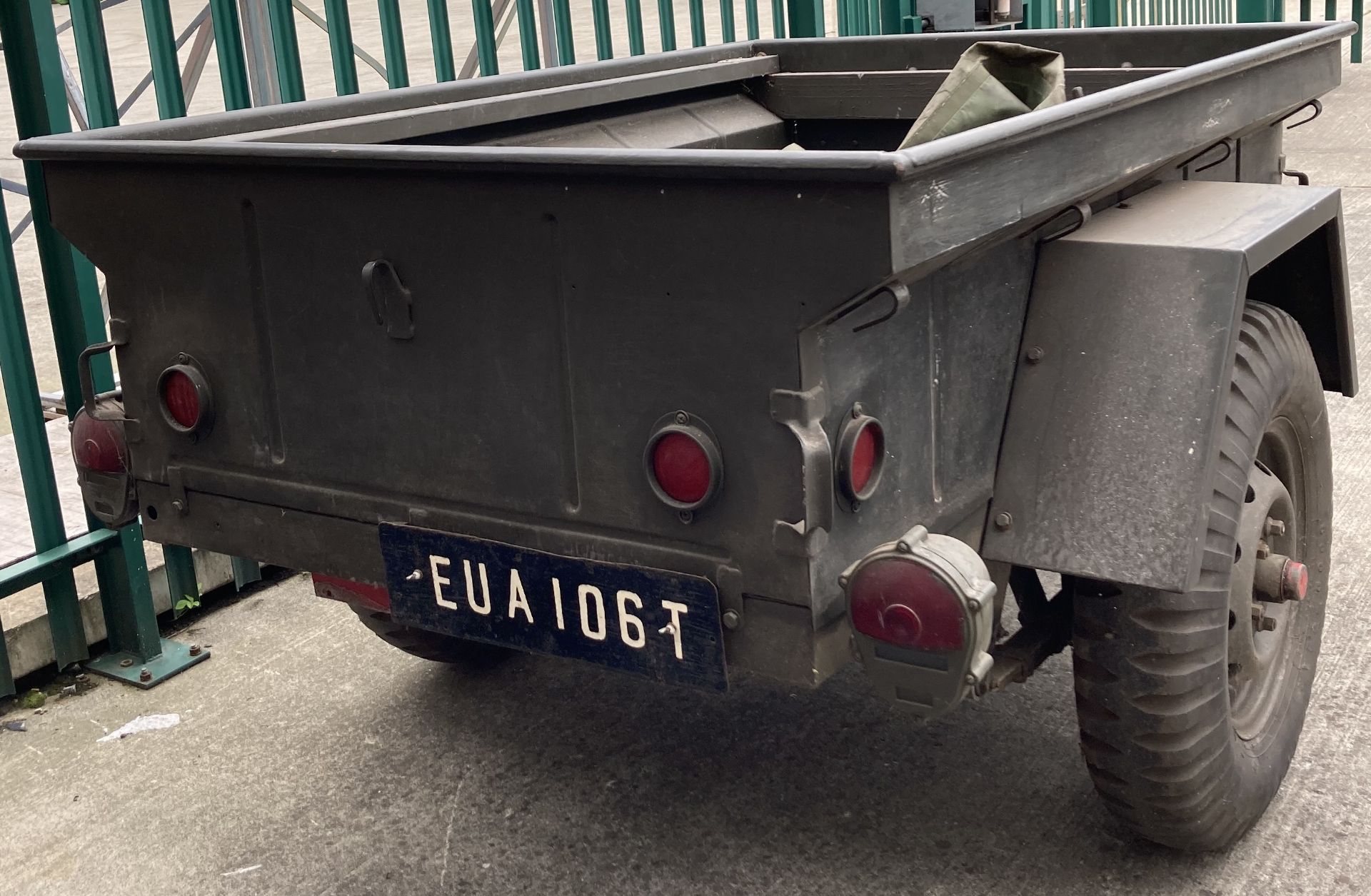 A military green metal single axle trailer, 130cm x 190cm x 147cm deep, complete with cover, - Image 3 of 5