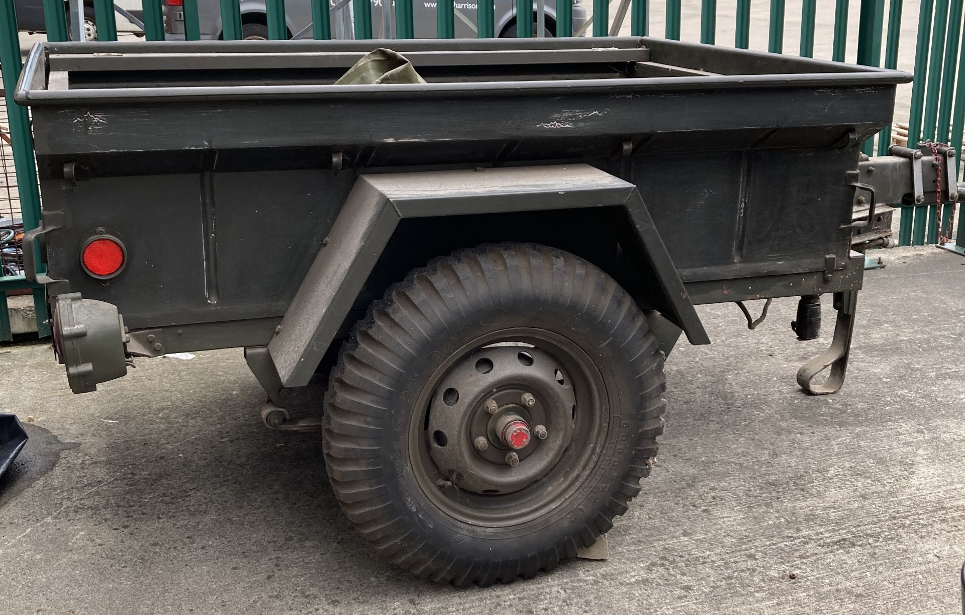 A military green metal single axle trailer, 130cm x 190cm x 147cm deep, complete with cover, - Image 5 of 5