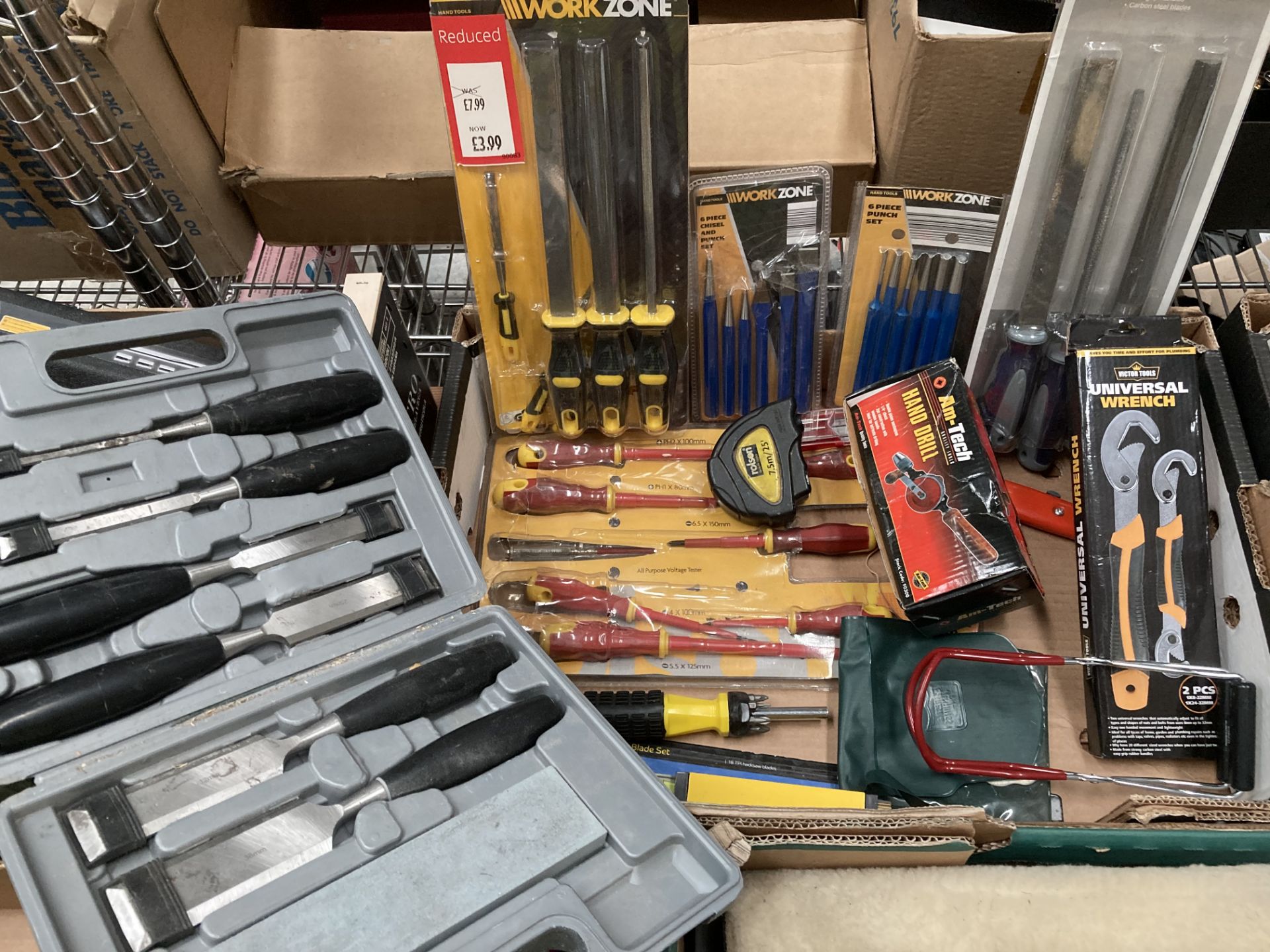 Contents to crate - assorted chisels, punch sets, wood chisels, file sets, hand drill, etc.