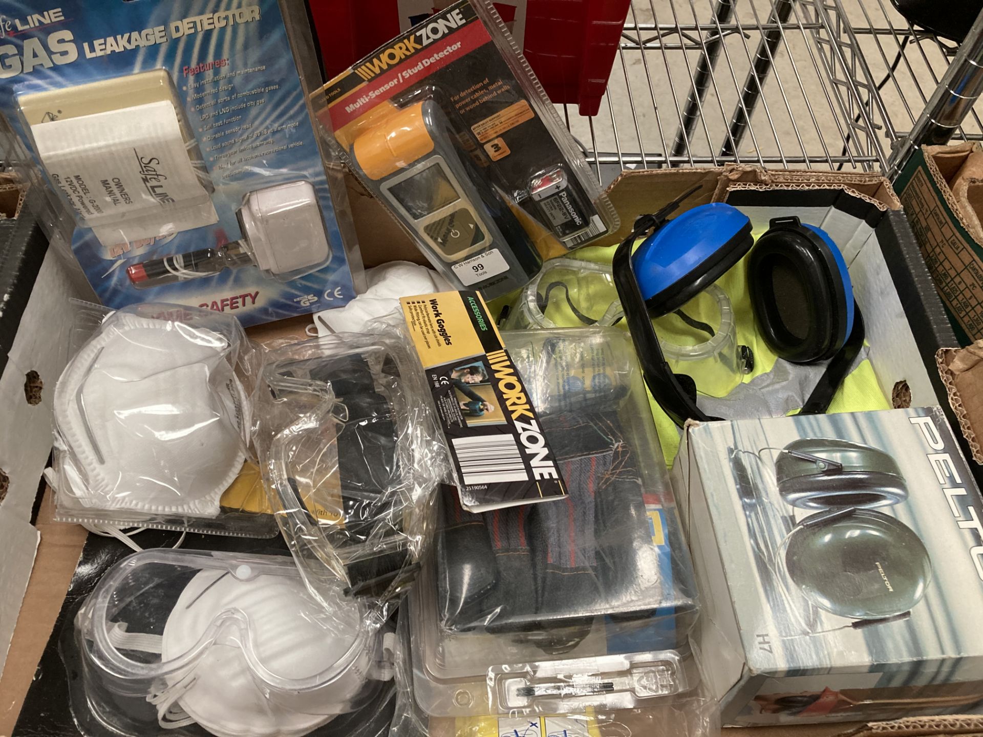 Contents to box - assorted safety equipment - ear defenders, eye protectors, hi-viz,