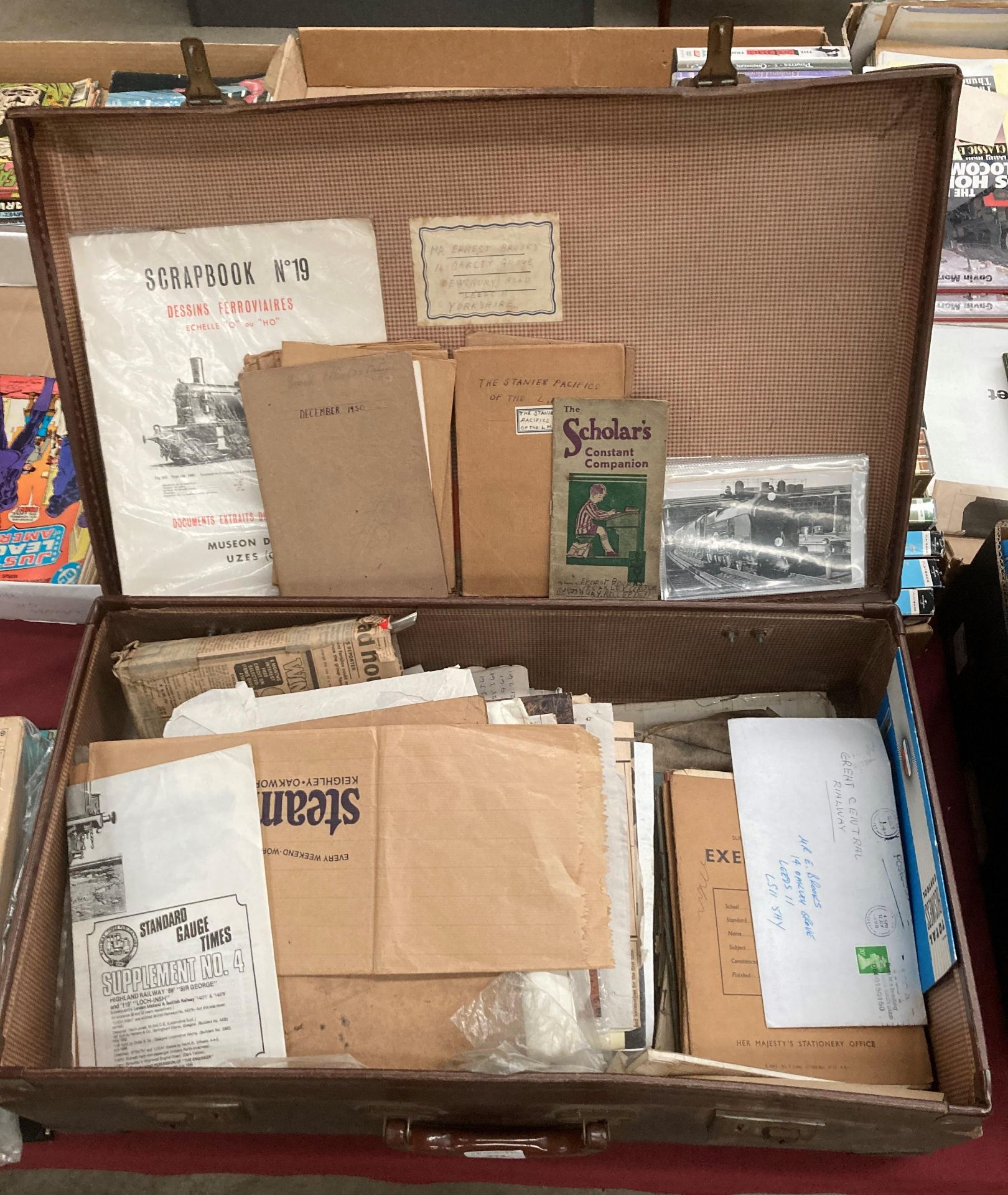 Brown fibre suitcase and contents - an interesting collection of ephemera including a quantity of