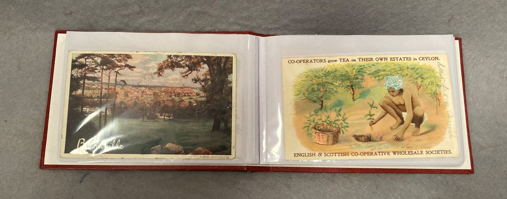 A small postcard album and contents thirty six postcards mainly related to advertising and song