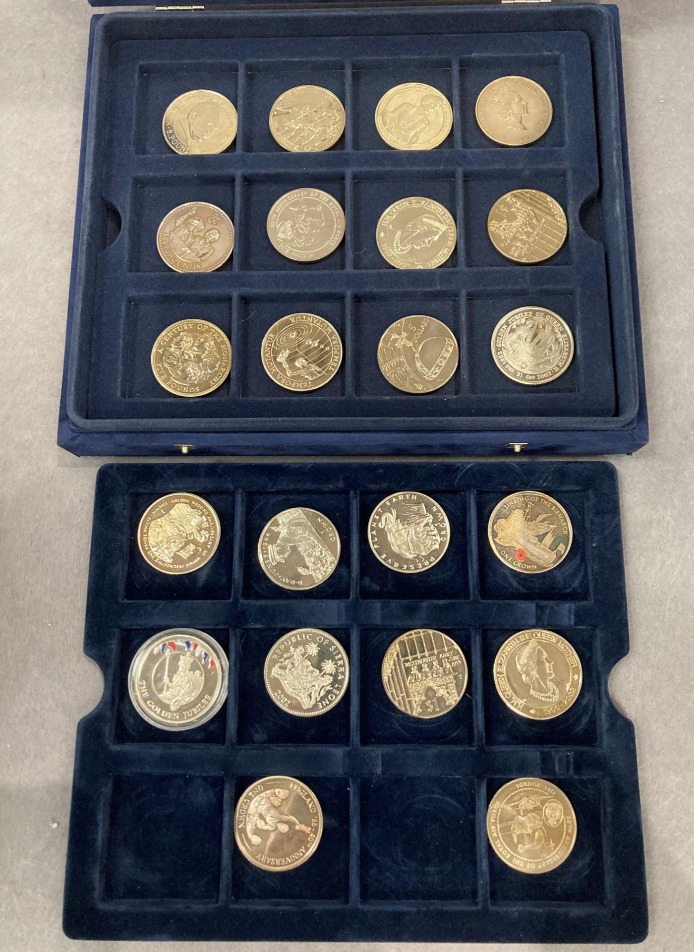 Blue presentation box of world crown sized coins (22)