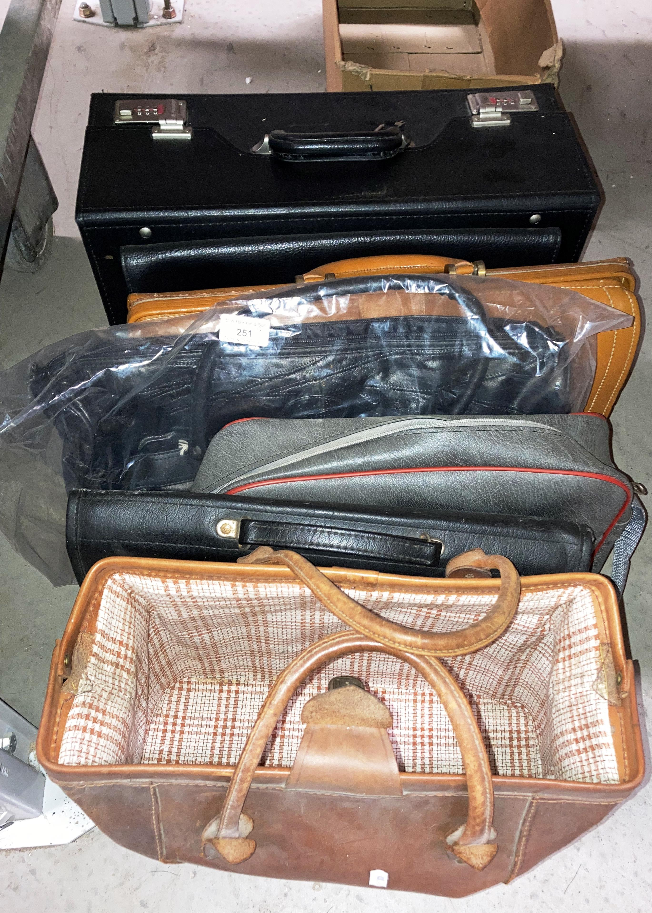 Two briefcases and four other bags (6)