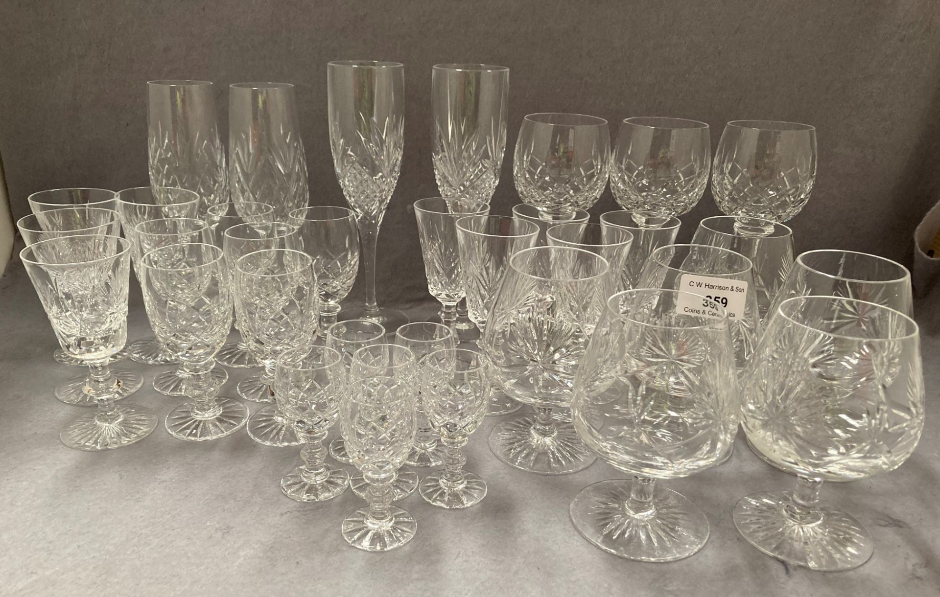 Contents to top of cabinet - a small quantity of Edinburgh crystal and other glasses,