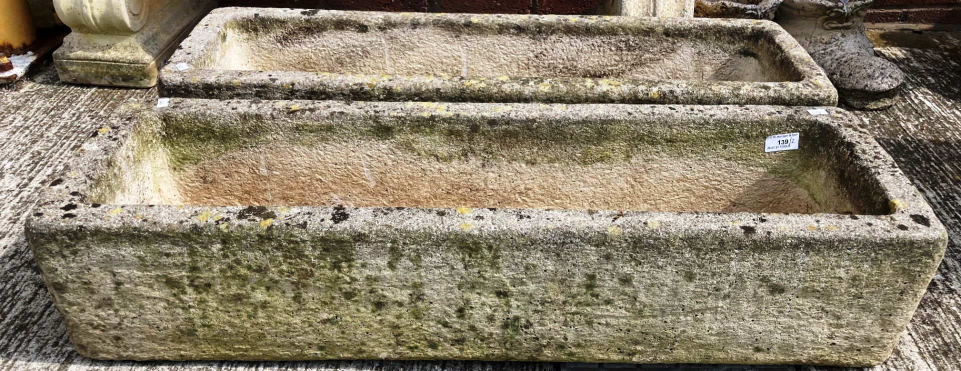 A pair of Sandford Stone composition and concrete planters each 86 x 26 x 15cm deep