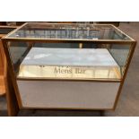 A gilt metal framed shop display cabinet 'Men's Bar' 100cm x 60cm x 92cm high