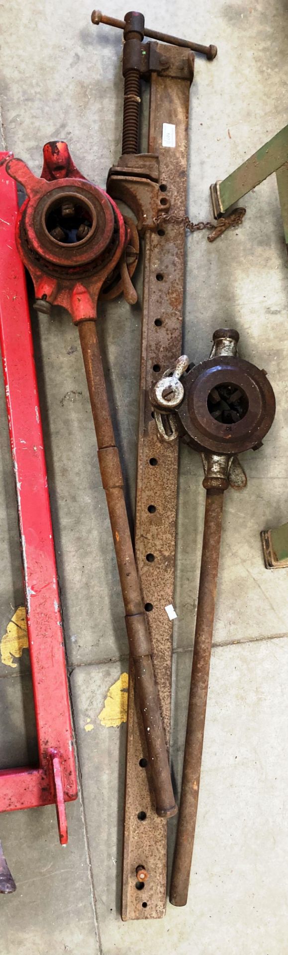 Three items - large sash cramp 140cm and two pipe vices/cutters