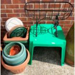 A child's outdoor green plastic table,