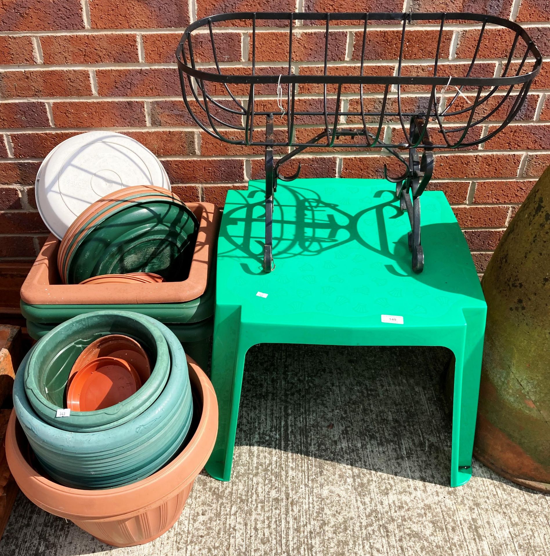 A child's outdoor green plastic table,