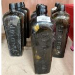 Ten brown gin bottles - five African, three V. Marken & Co and two V.