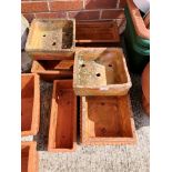 Six various terracotta planters