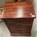 A pine three drawer bedside chest of drawers 48cm