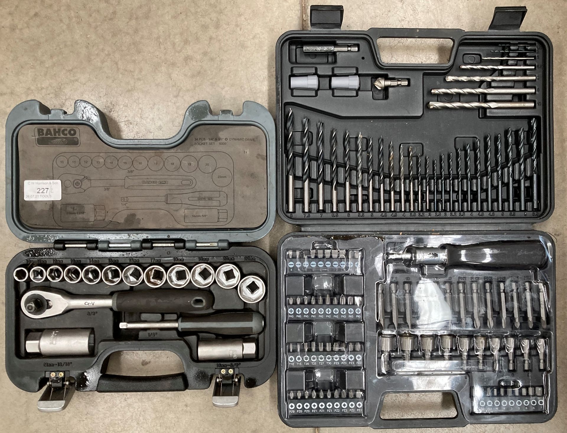 A Bahco 5330 34 piece ¼" 3/8" dynamactive socket set and a cased drill bit set (2)