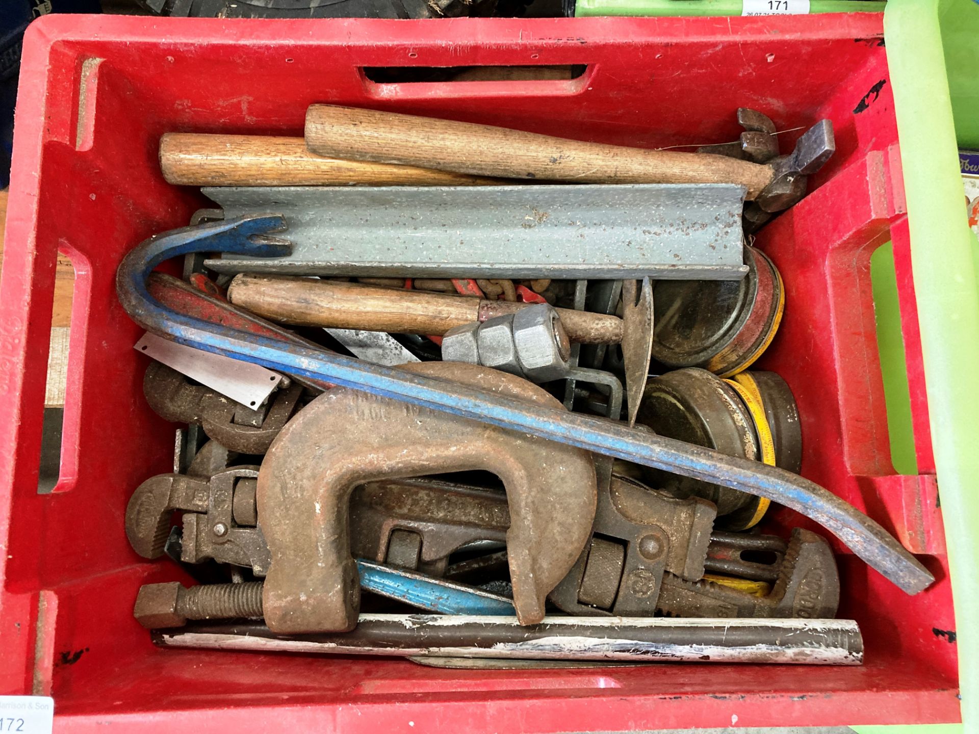 Red plastic box and contents - hammers, stillsons, jemmy,