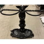 Reproduction black metal cast two section umbrella stand of a dog holding a whip 80cm high
