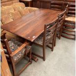 An oak Old Charm dining table 152 x 82cm together with six dining chairs (two carvers) with Windsor