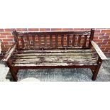 A wood garden bench 160cm long