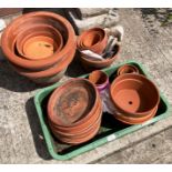 Quantity of Terracotta plant pots and plant pot trays - one large plant pot cracked and others as