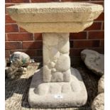 A concrete bird bath on pedestal 34 x 3 x 56cm high