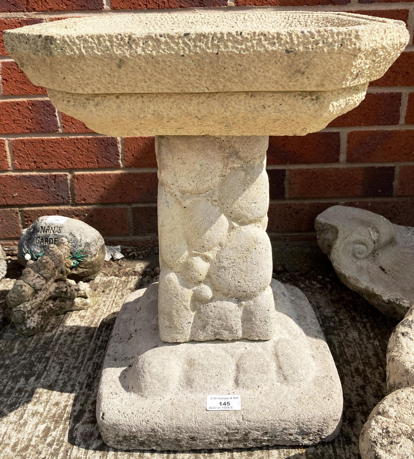 A concrete bird bath on pedestal 34 x 3 x 56cm high