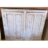 A white painted pine two door cabinet 152 x 32cm deep x 126cm high