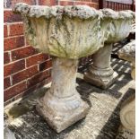 A pair of composition and concrete garden pedestal planters each 34cm dia x 64cm high