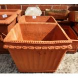 A pair of square terracotta planters each 30 x 30 x 23cm high