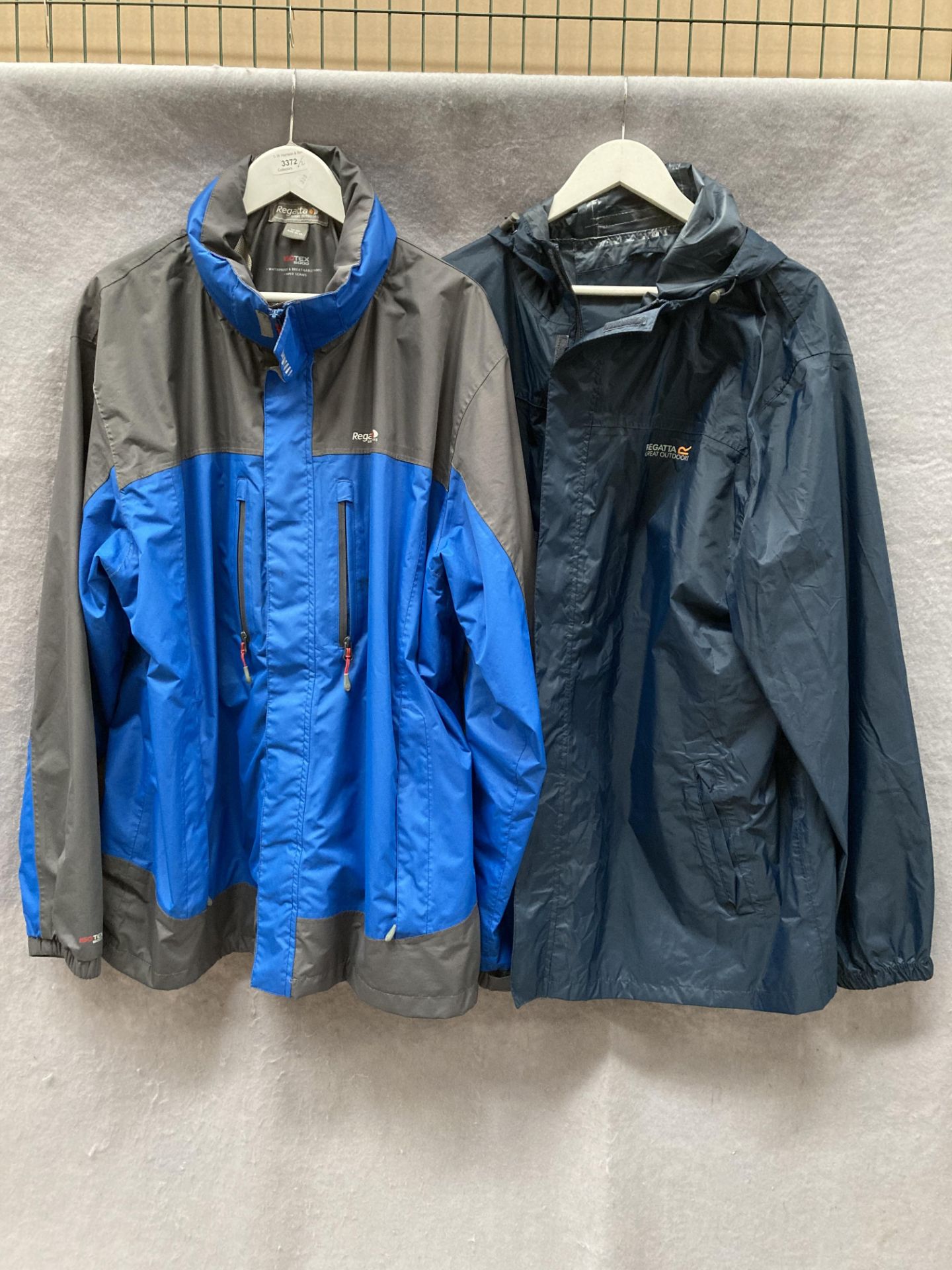 A Regatta Isotex 5000 outdoor coat in blue and grey, size 2XL and a Regatta dark blue thin coat,