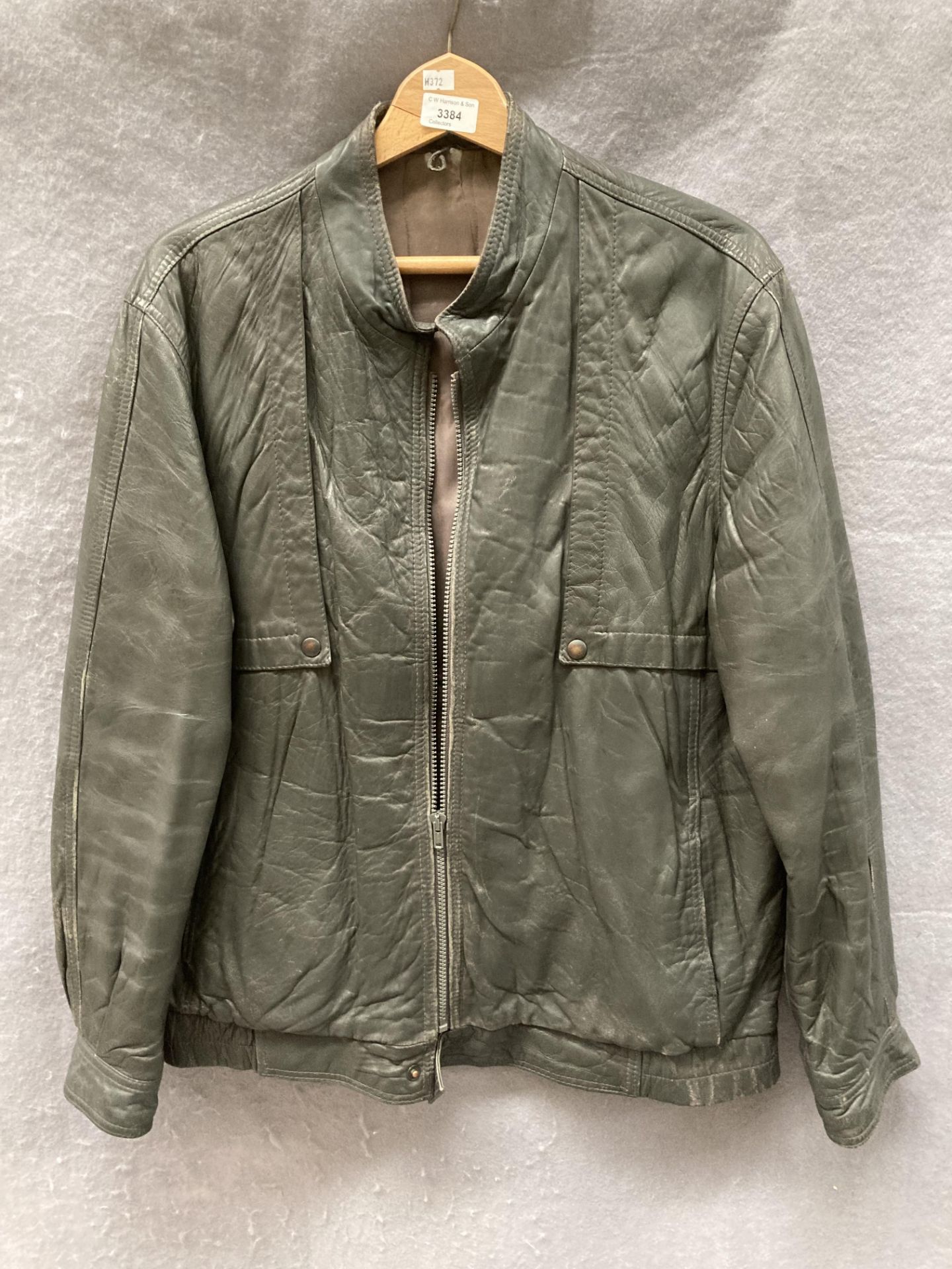 A St Michael's grey leather jacket,