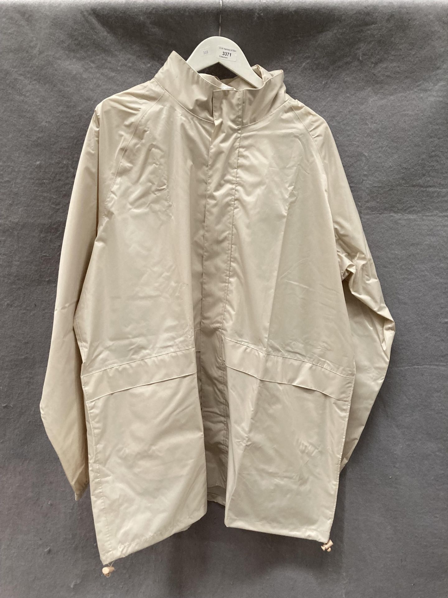 A Cotton Traders Packaway beige outdoor jacket,