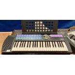 A Yamaha PSR-73 electronic keyboard - no power lead - not tested