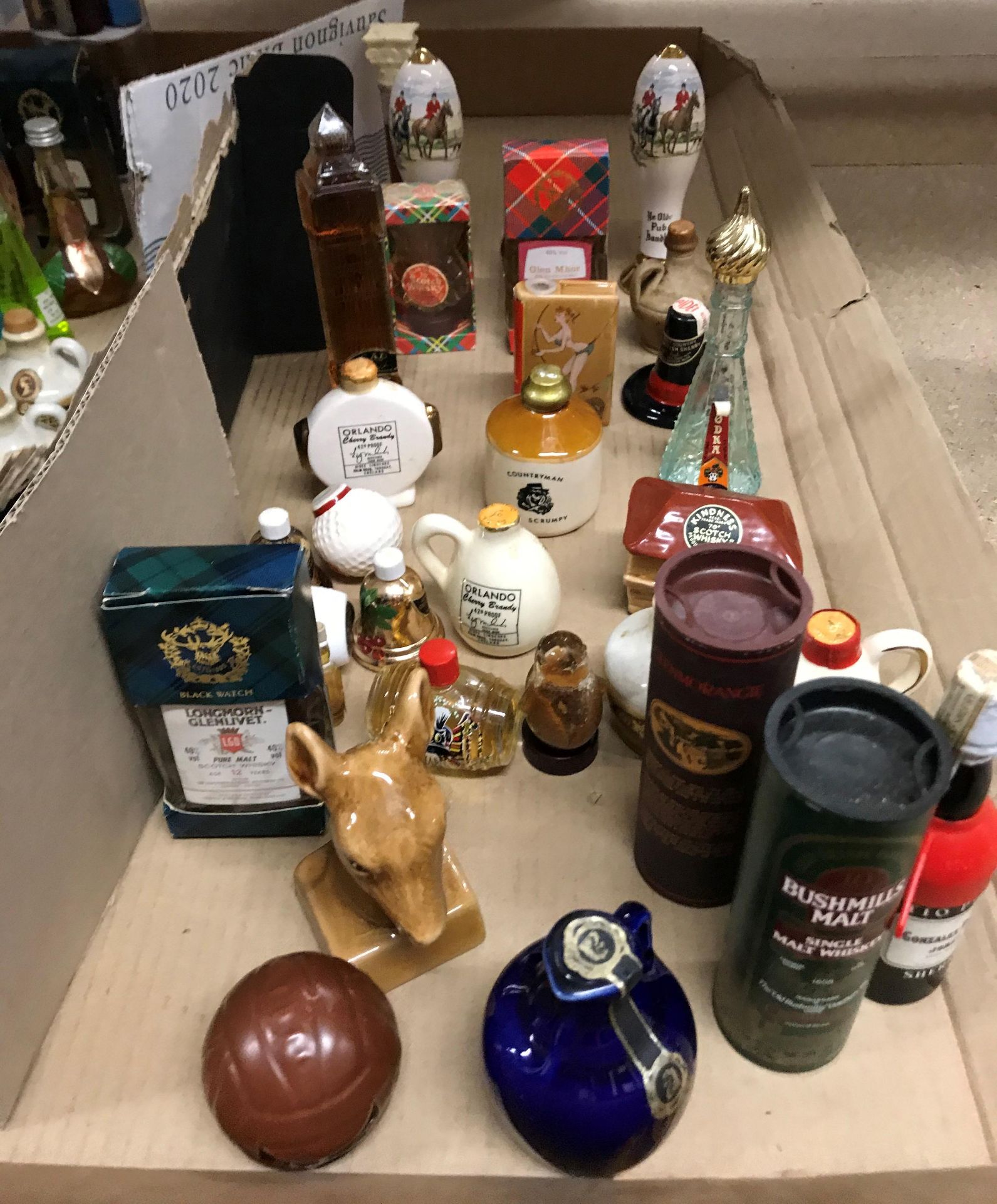 Contents to half of tray 28 novelty miniature liqueur and spirits - Orlando Cherry Brandy in a